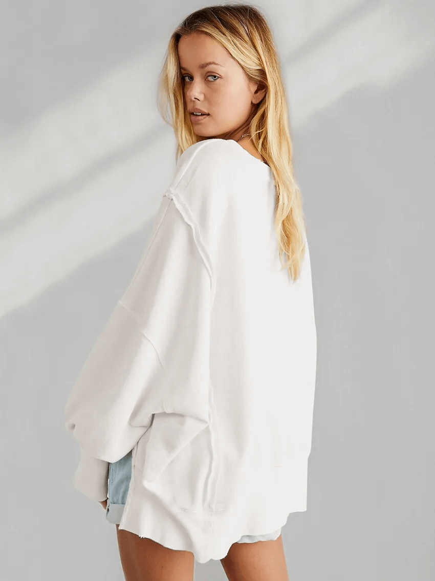 Model wearing Fashion Solid Color Drop Shoulder Loose Sweatshirt for Women, white, three-quarter sleeves, casual polyester style, SF1582